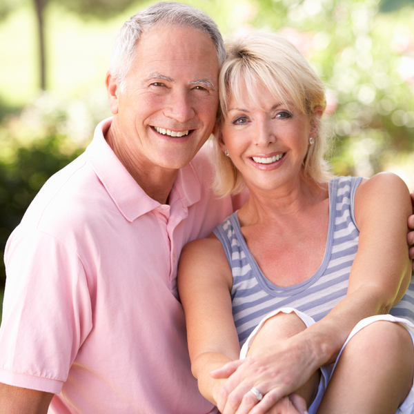 Periodontics & Gum Disease Elderly Couple Sitting Outdoors
