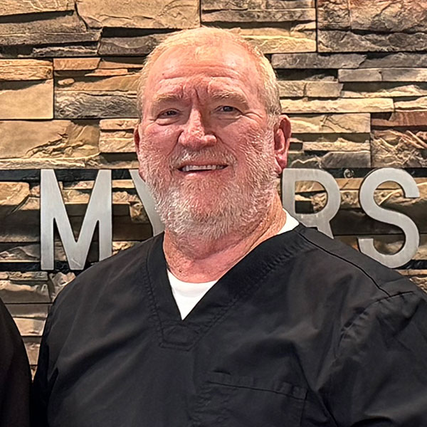 DrMyers Woman with Red Hair Smiling Indoors